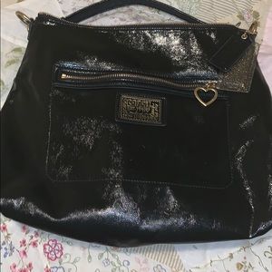 Coach Poppy in black with crossbody adj strap